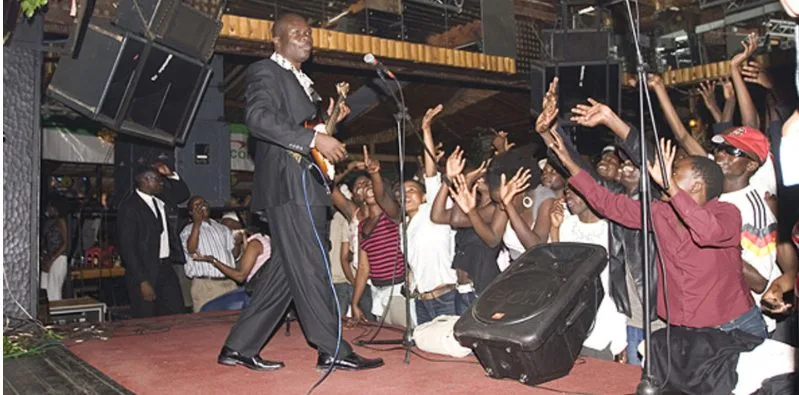 Musa Juma entertaining fans at an event